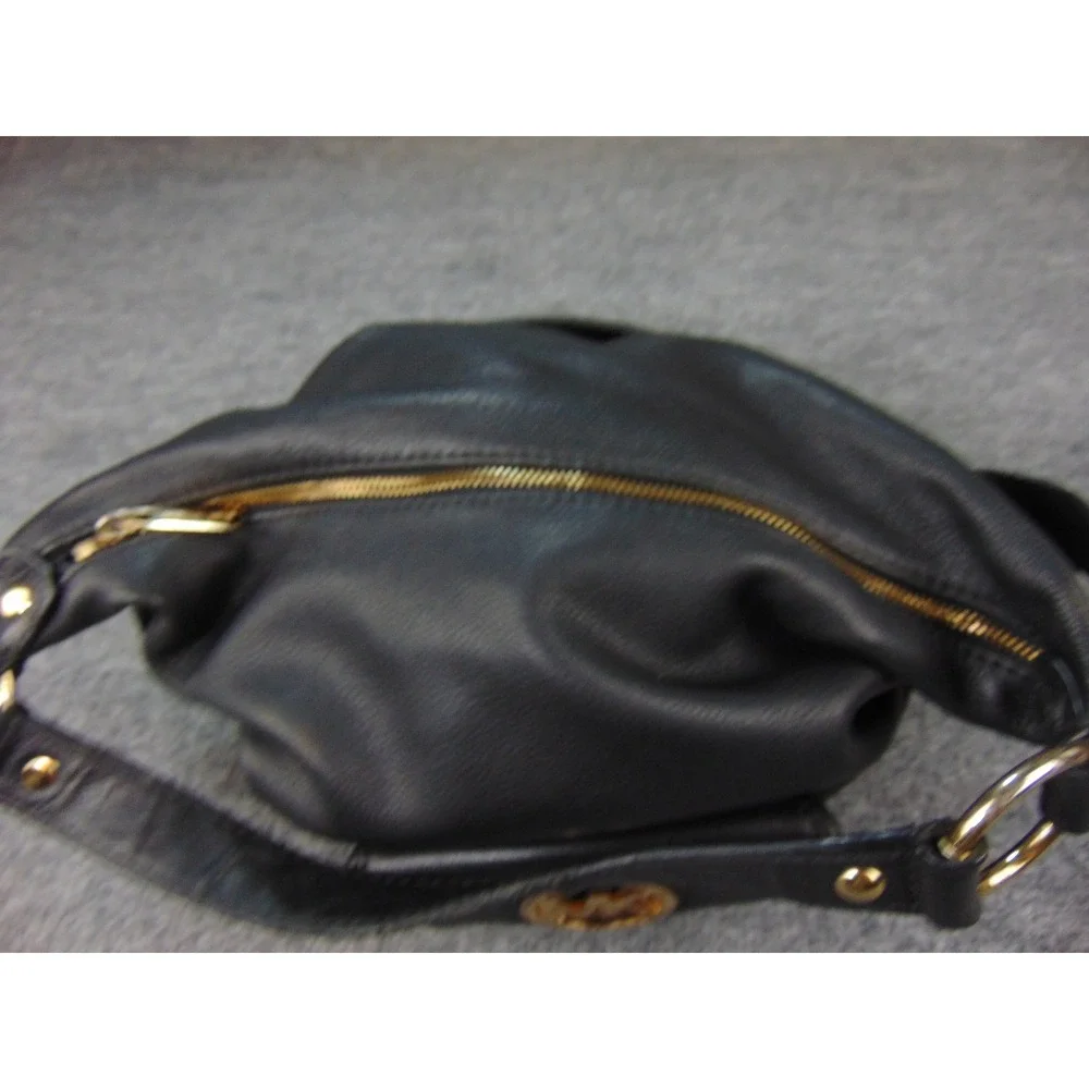 Michael Kors notice wear